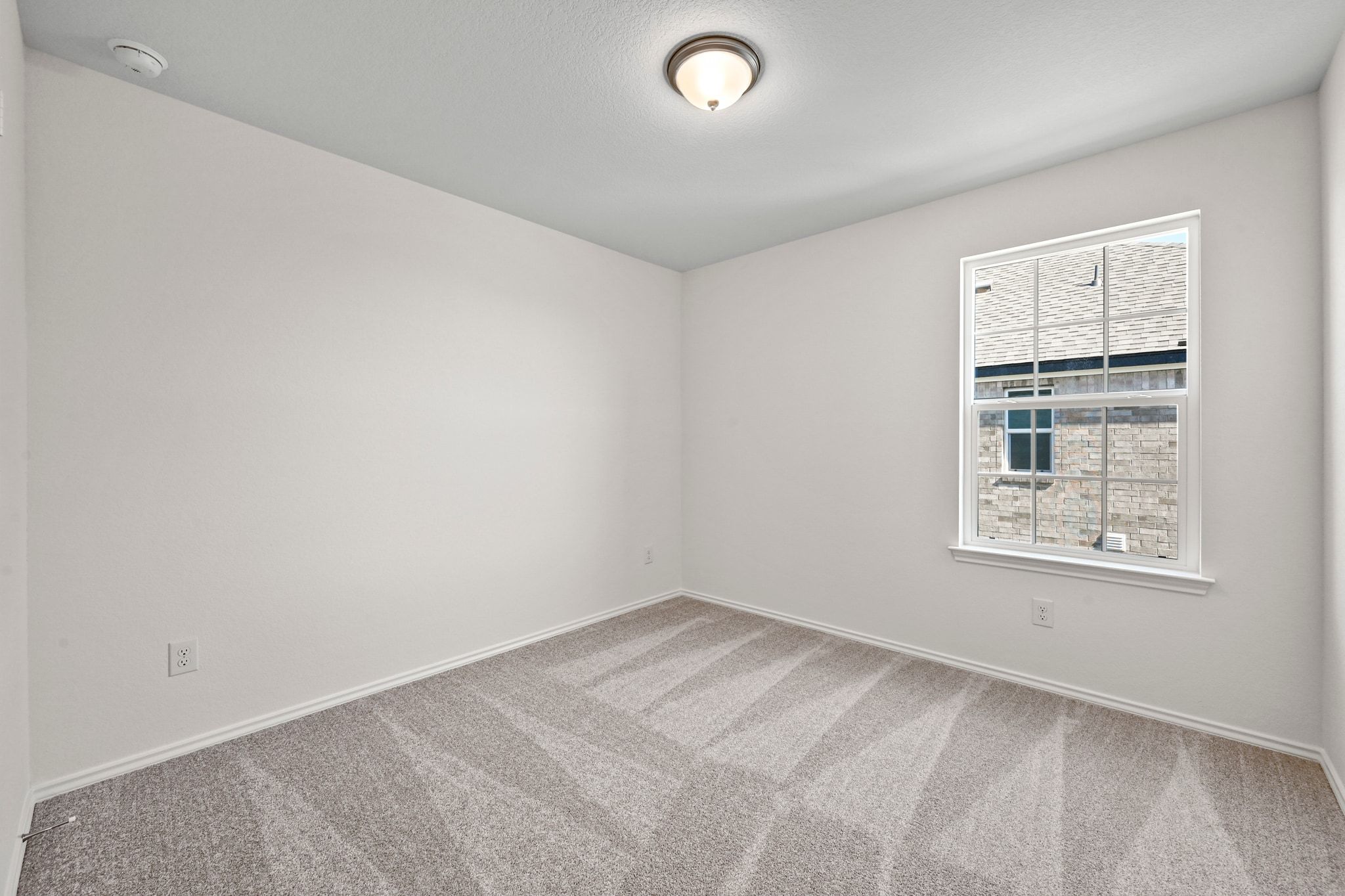 15004 Garrano Way Manor, TX 78653 - Photo 25 of 34 an empty room with windows