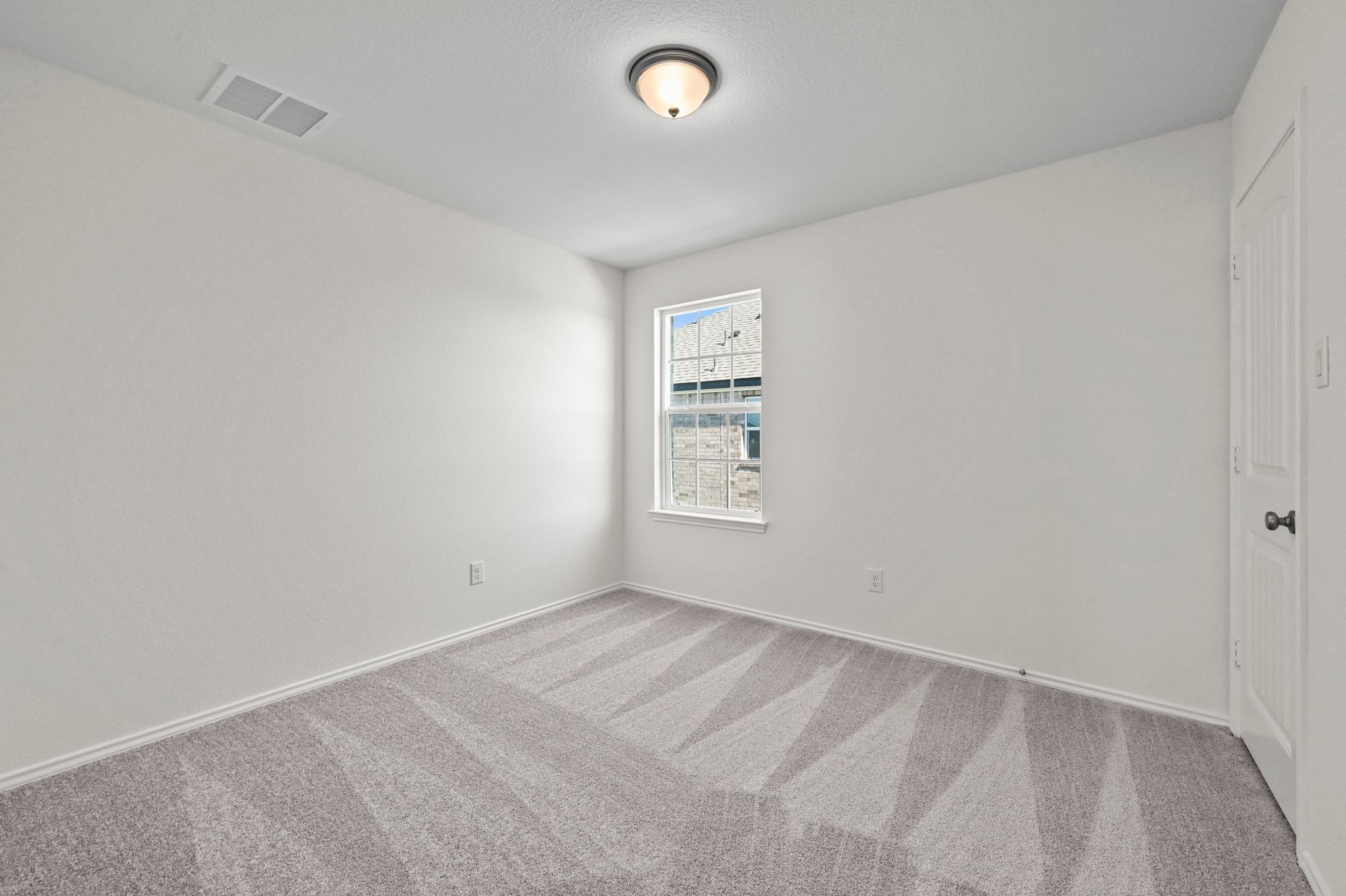 15004 Garrano Way Manor, TX 78653 - Photo 26 of 34 an empty room with windows