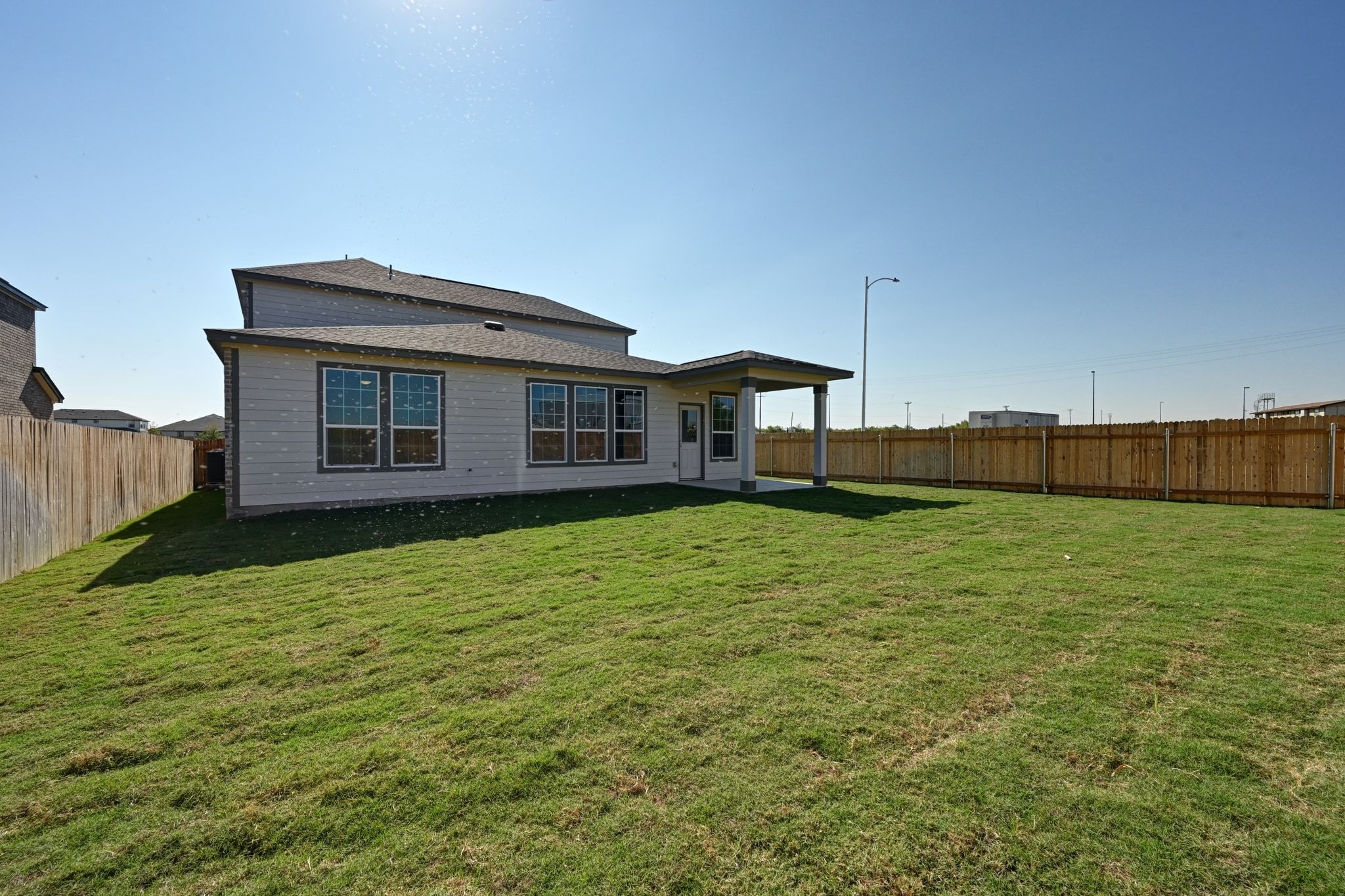 15004 Garrano Way Manor, TX 78653 - Photo 31 of 34 a house view with a garden space