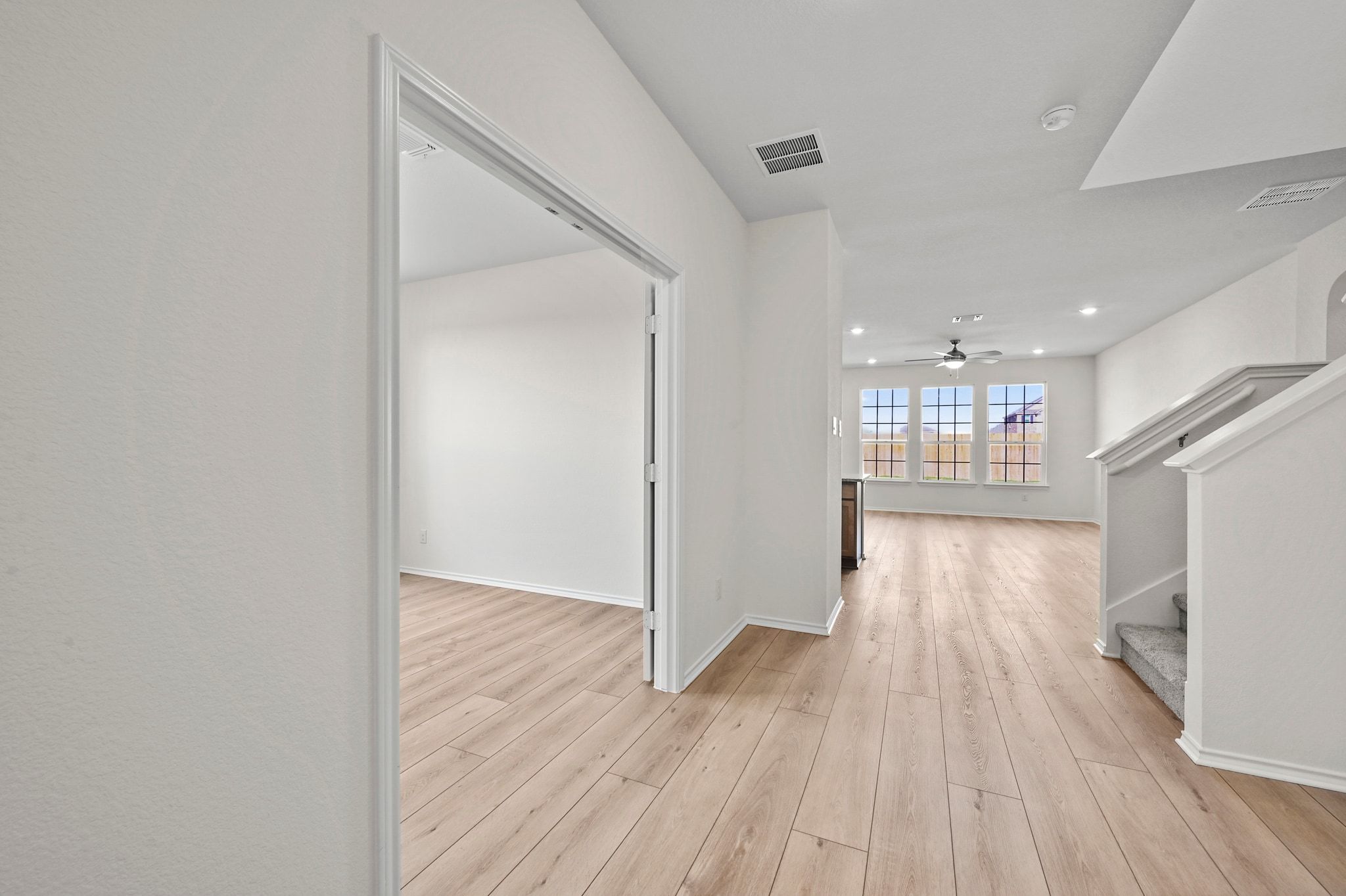 15004 Garrano Way Manor, TX 78653 - Photo 5 of 34 a view of a kitchen with wooden floor