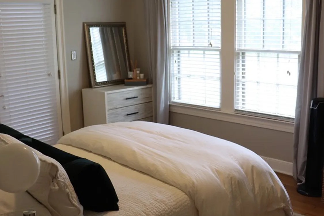 1200 Alegria Road, Unit 1 Austin, TX 78757 - Photo 8 of 16 Primary bedroom with lots of natural light