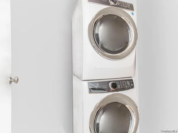 a utility room with dryer and washer
