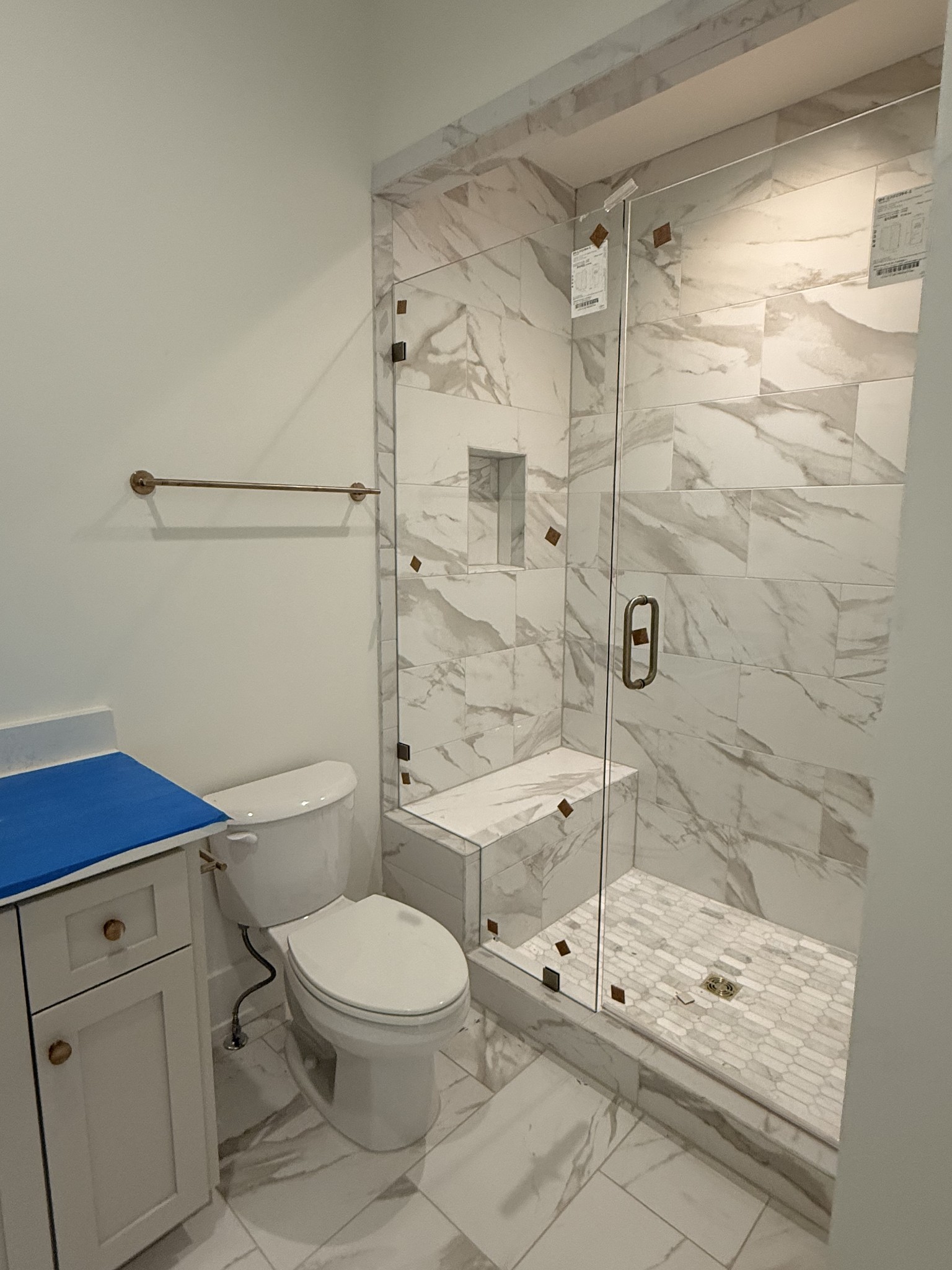 1006 Legrand Avenue Franklin, TN 37064 - Photo 11 of 23 a bathroom with a toilet sink vanity and shower