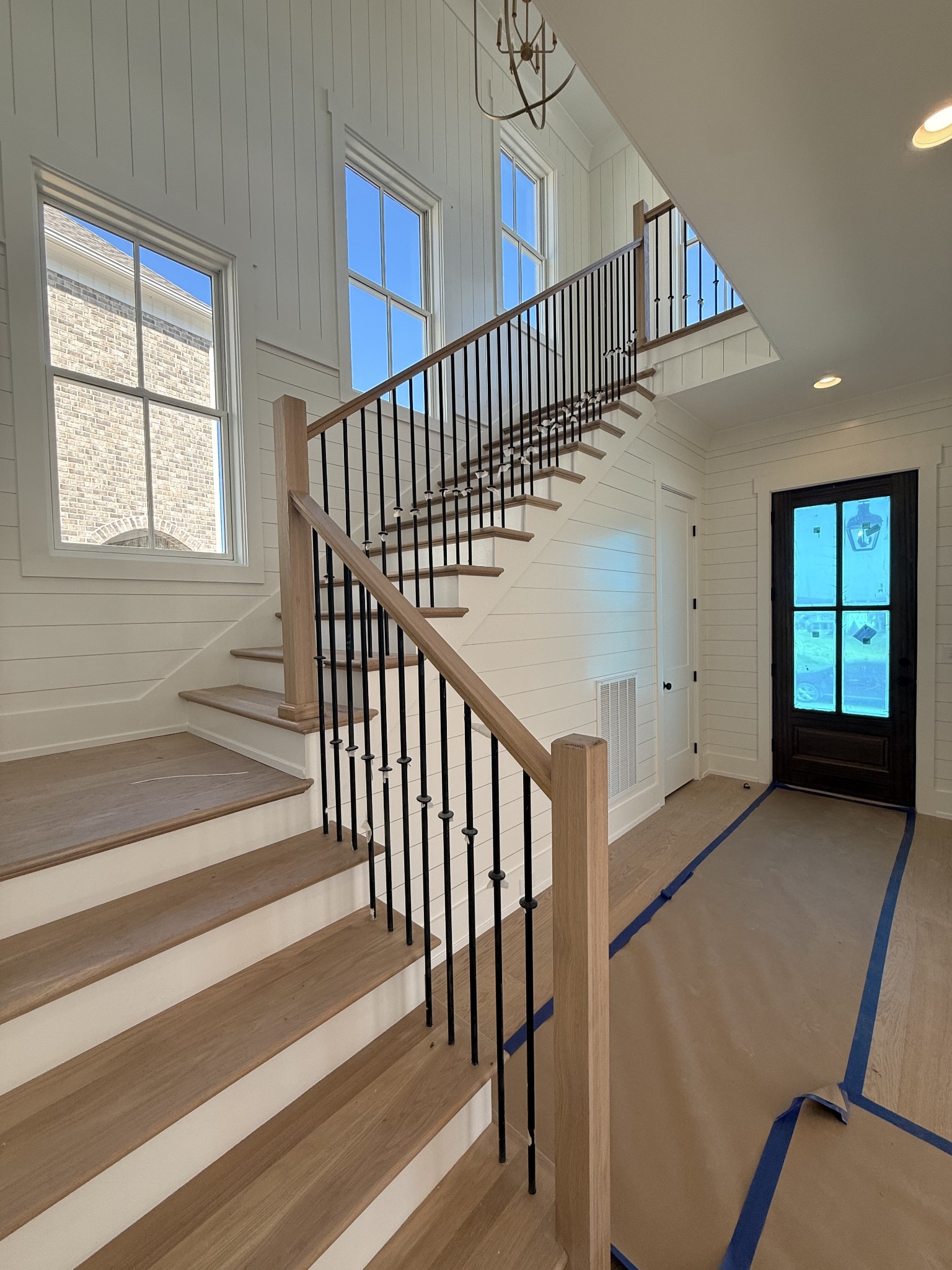 1006 Legrand Avenue Franklin, TN 37064 - Photo 2 of 23 a view of staircase with white walls and a window