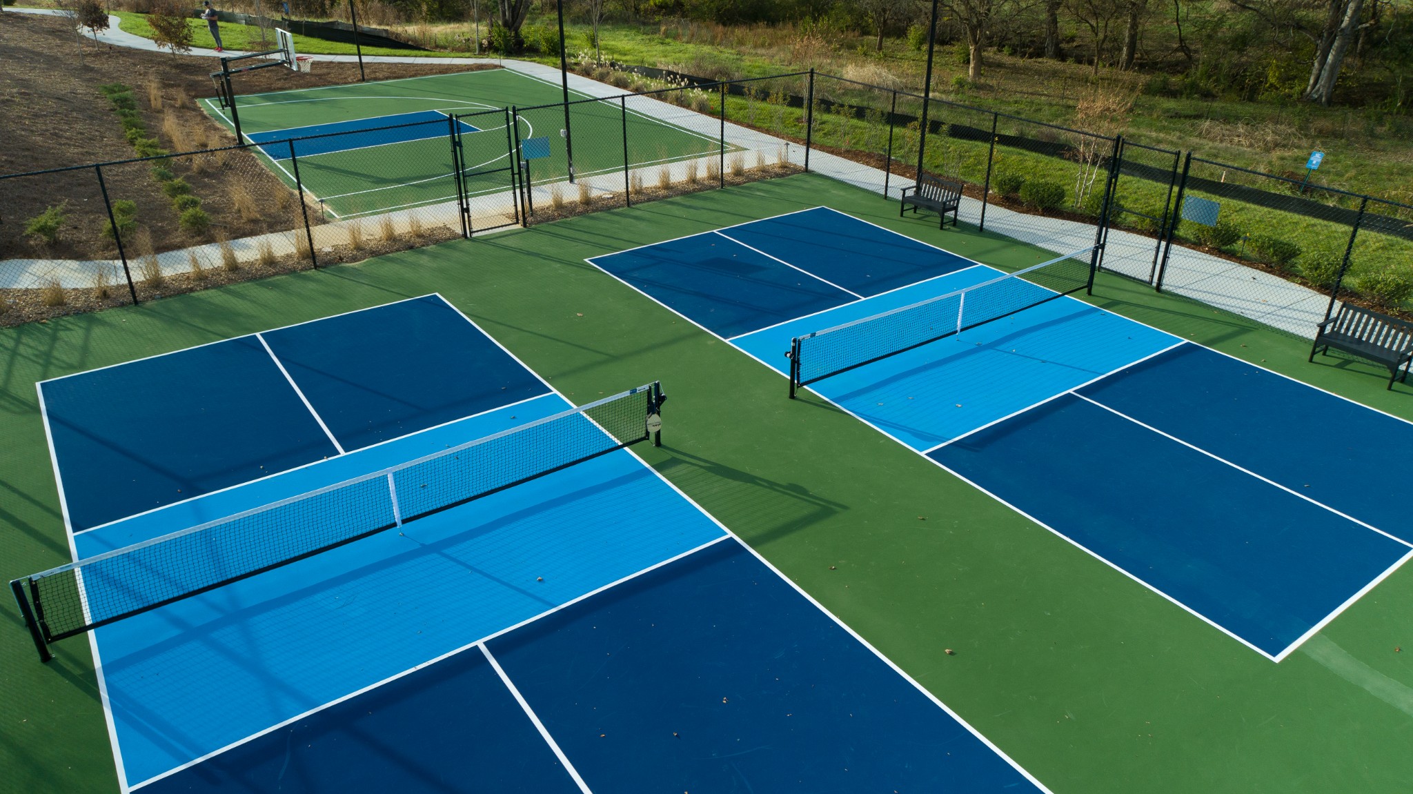 1006 Legrand Avenue Franklin, TN 37064 - Photo 22 of 23 a view of a tennis ground with large trees