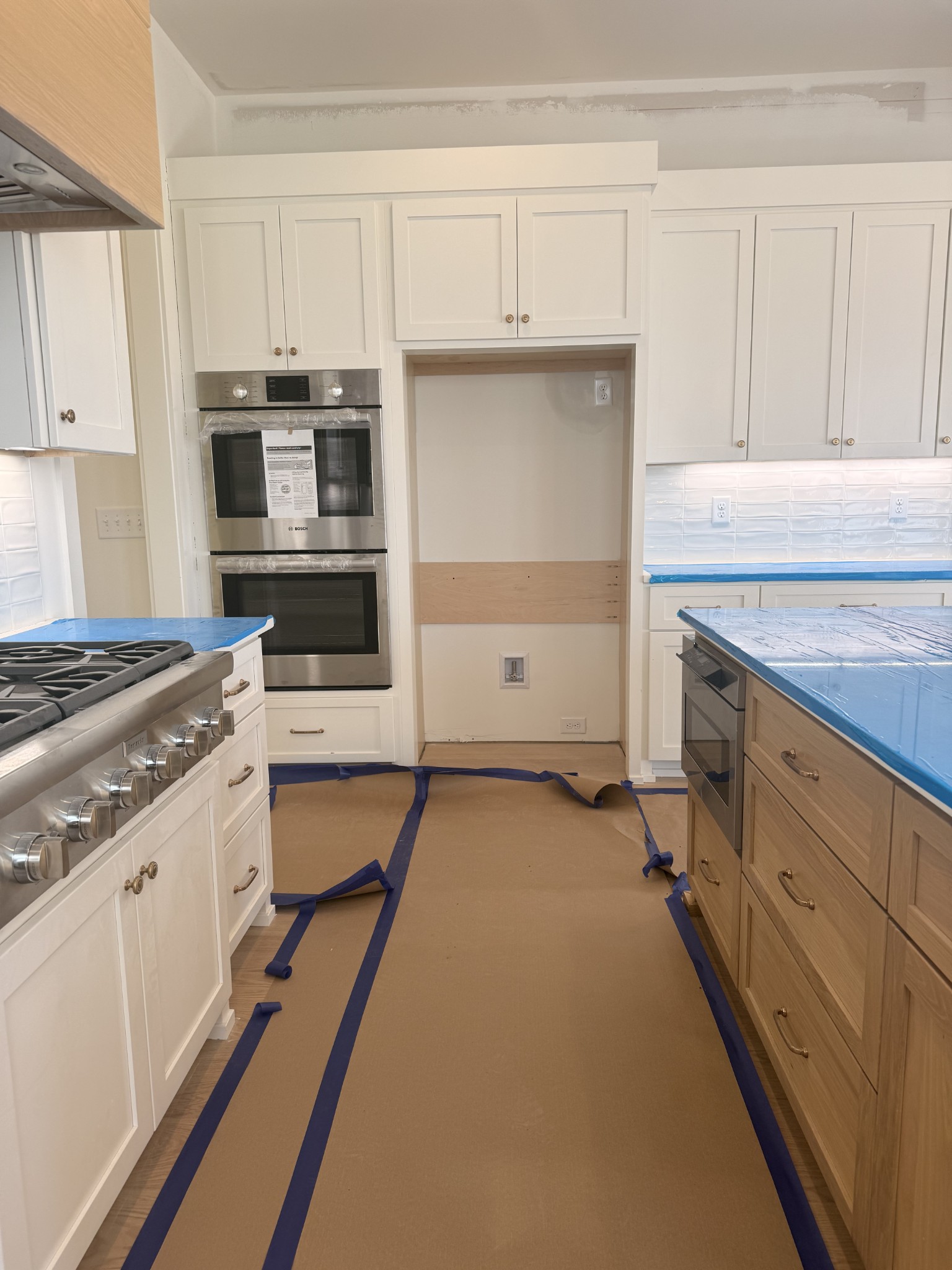 1006 Legrand Avenue Franklin, TN 37064 - Photo 5 of 23 a kitchen with stainless steel appliances a stove sink and cabinets