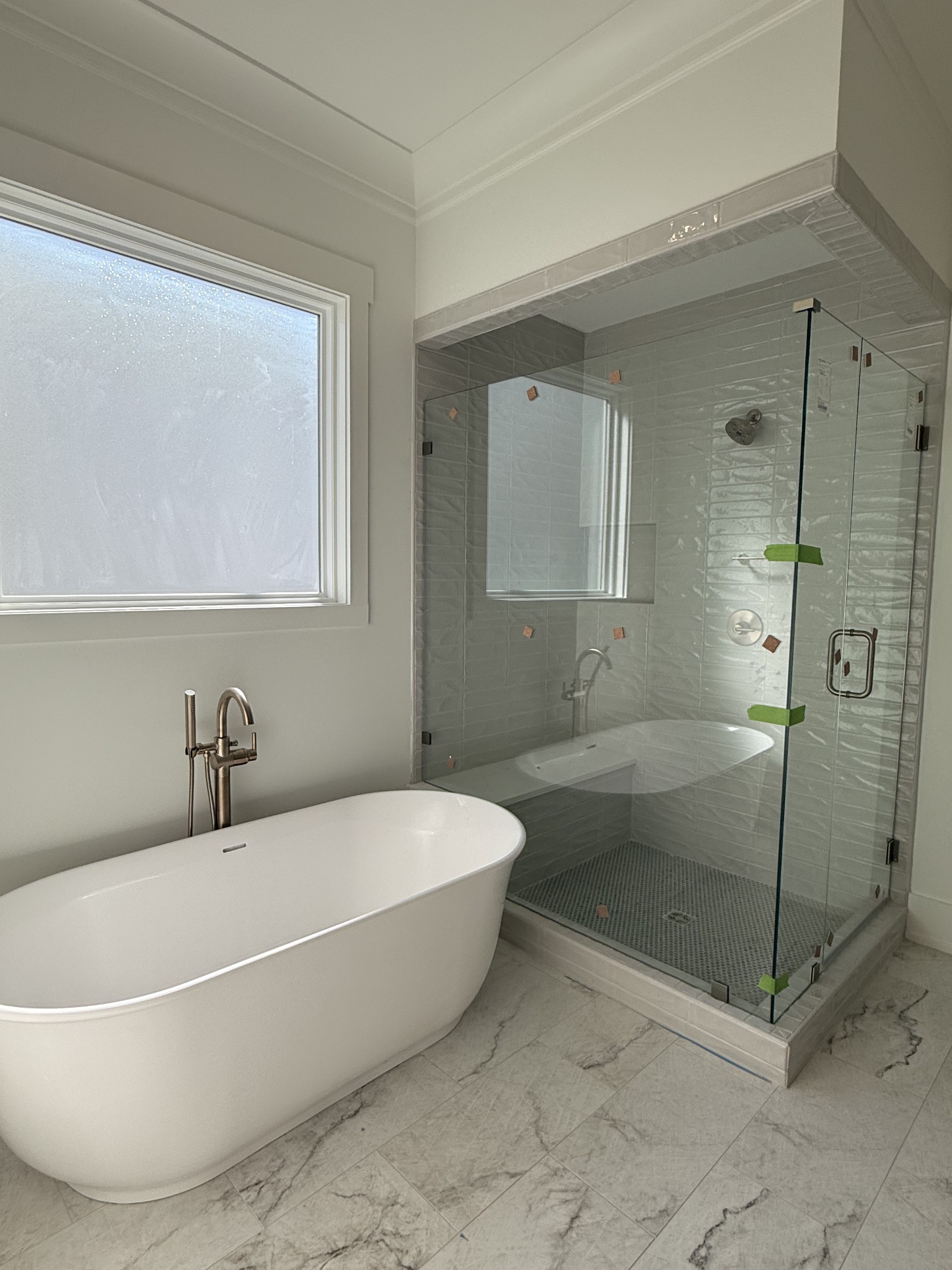 1006 Legrand Avenue Franklin, TN 37064 - Photo 7 of 23 a white bath tub sitting next to a shower