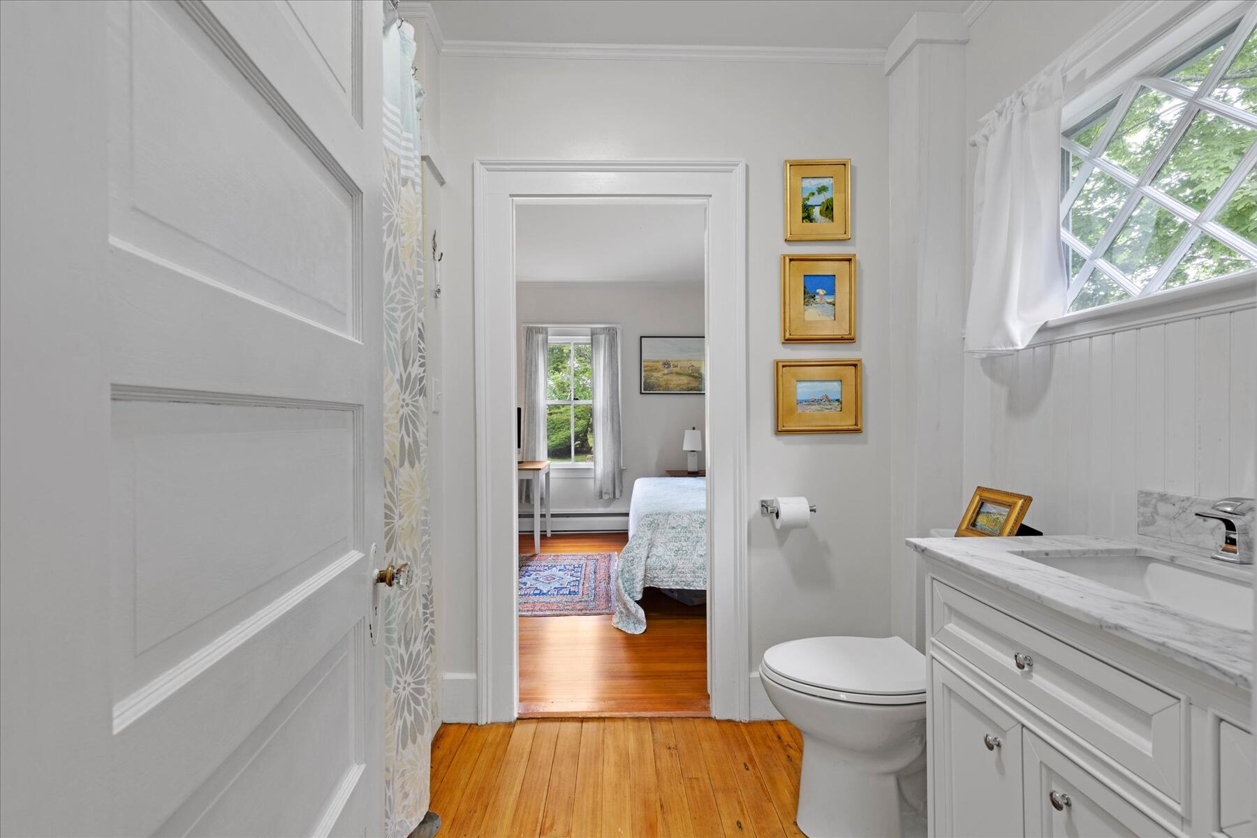 21 Quaker Road East Sandwich, MA 02537 - Photo 18 of 43 a bathroom with a sink and a toilet