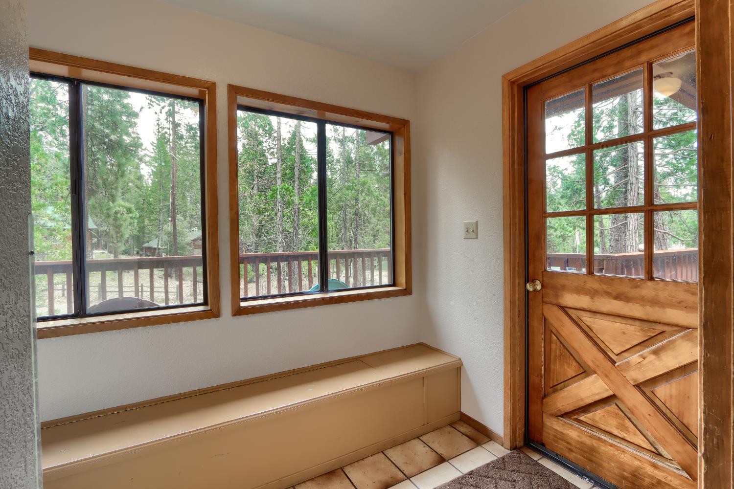 8041 Chilnualna Falls Road Wawona, CA 95389 - Photo 28 of 46 a view of an empty room with a window