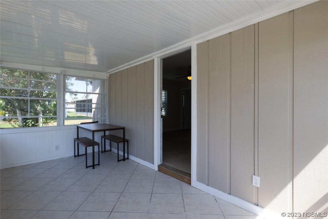 14 Chip Lane New Smyrna Beach, FL 32168 - Photo 16 of 54 a view of dining room with furniture and window