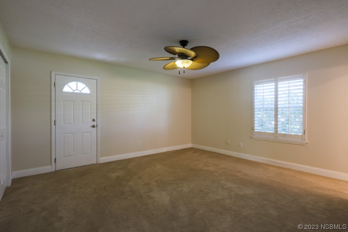 14 Chip Lane New Smyrna Beach, FL 32168 - Photo 41 of 54 an empty room with a window