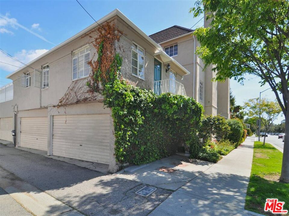 360 South Roxbury Drive Beverly Hills, CA 90212 - Photo 29 of 30 a view of a house with a yard