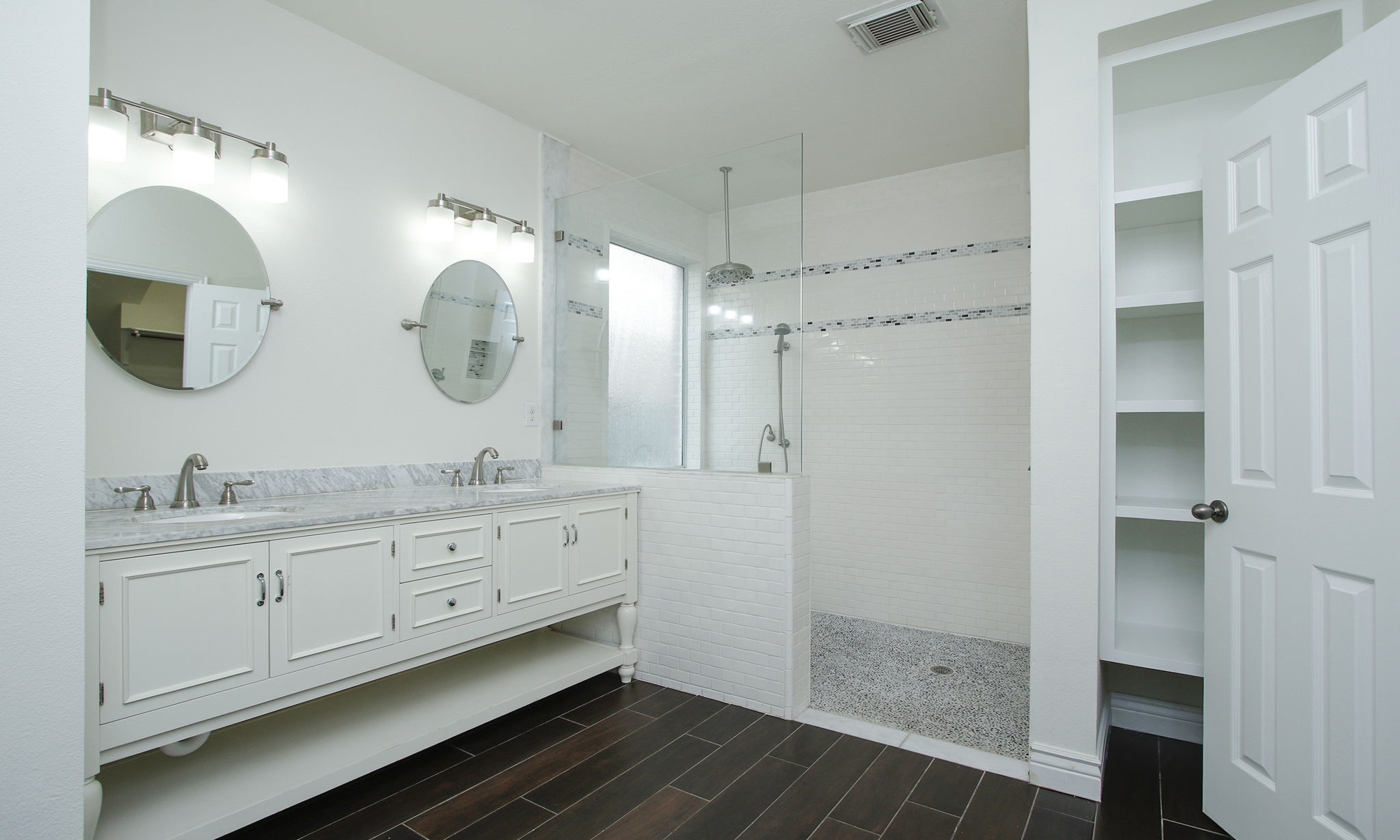 1210 Berwick Manor Court Spring, TX 77379 - Photo 10 of 50 a bathroom with a double vanity sink mirror and shower