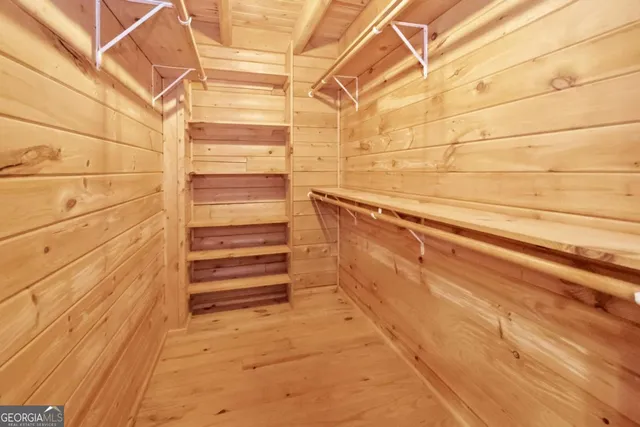a bathroom with a bathtub and a window