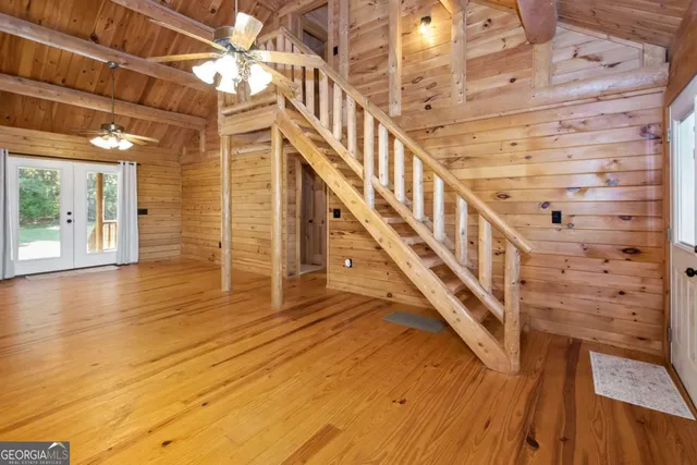 a view of porch with wooden floor