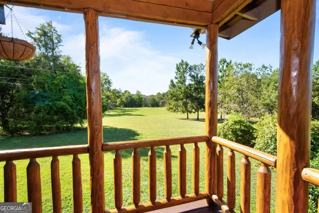 a backyard of a house with lots of green space