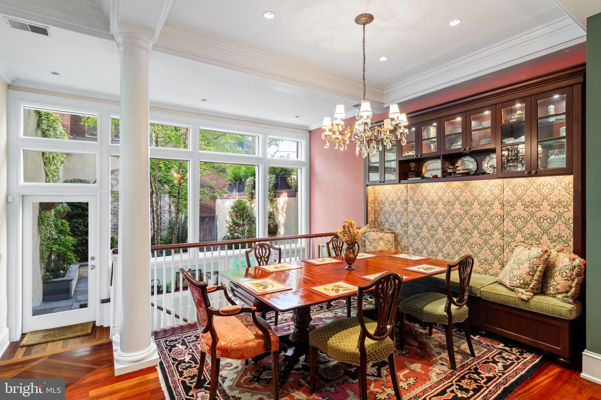 501 Pine Street Philadelphia, PA 19106 - Photo 14 of 52 a dining room with furniture a chandelier and wooden floor