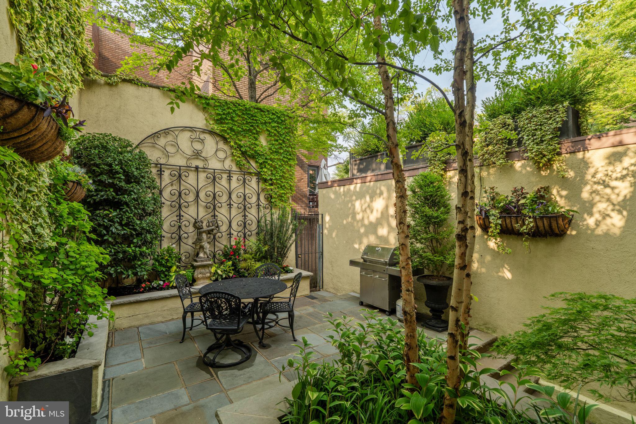 501 Pine Street Philadelphia, PA 19106 - Photo 17 of 52 a view of a patio with table and chairs and potted plants
