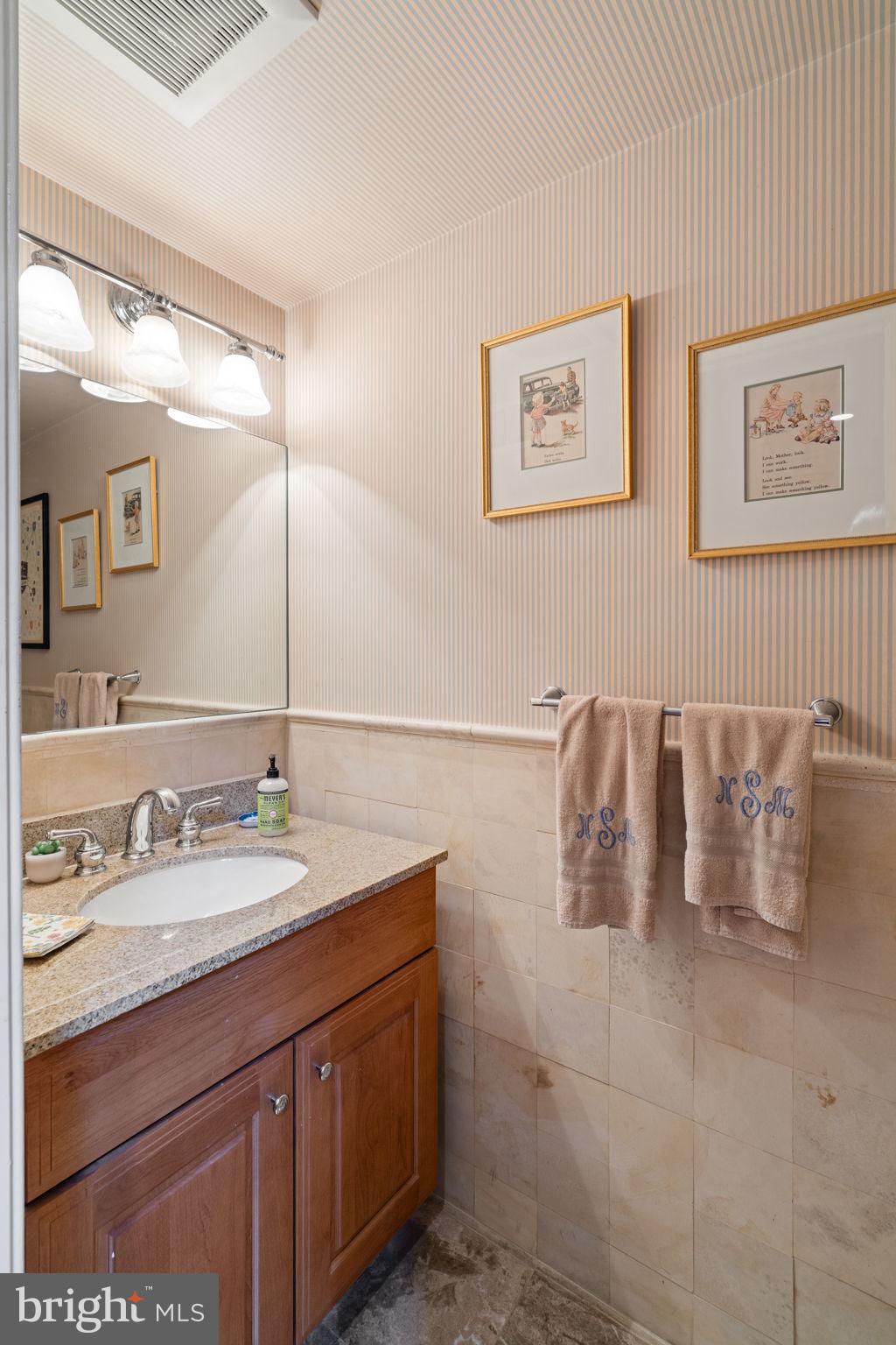 501 Pine Street Philadelphia, PA 19106 - Photo 25 of 52 a bathroom with a sink and a mirror