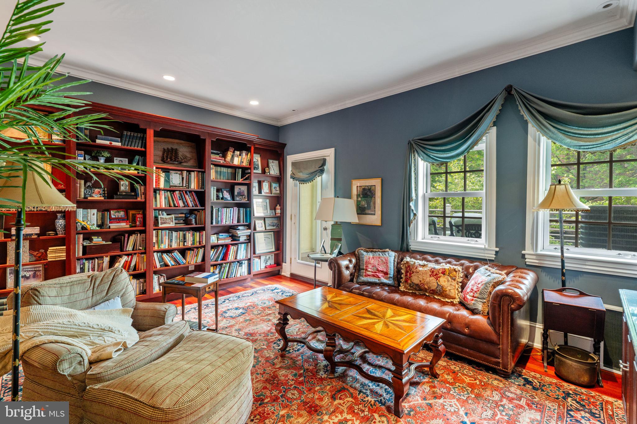 501 Pine Street Philadelphia, PA 19106 - Photo 29 of 52 a living room with furniture a large window and bookshelf