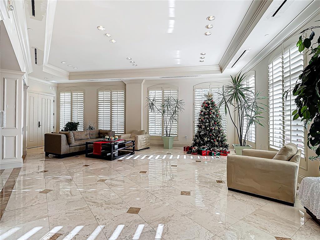 2745 First Street, Unit 111 Fort Myers, FL 33916 - Photo 47 of 79 a living room with furniture and a large window