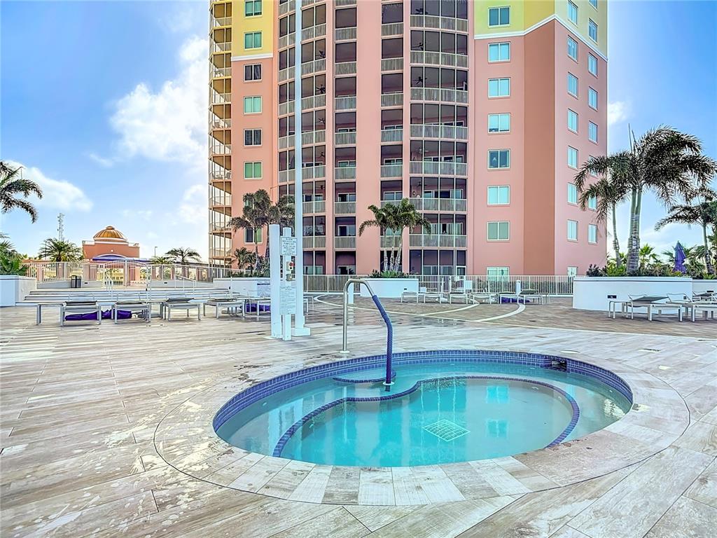 2745 First Street, Unit 111 Fort Myers, FL 33916 - Photo 51 of 79 a swimming pool with outdoor seating and city view