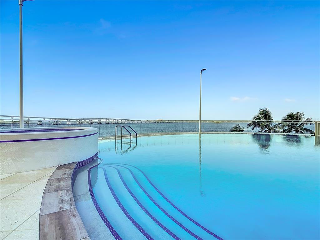 2745 First Street, Unit 111 Fort Myers, FL 33916 - Photo 57 of 79 a room with a table and chairs