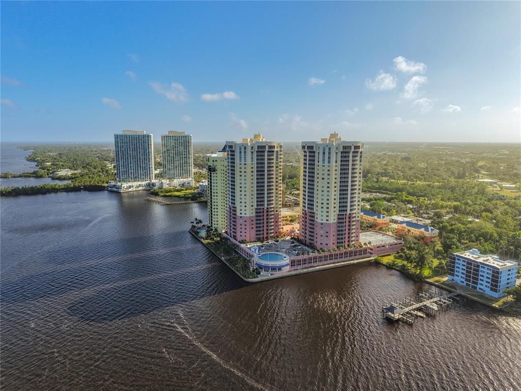2745 First Street, Unit 111 Fort Myers, FL 33916 - Photo 78 of 79 a view of a balcony with floor to ceiling windows and city view