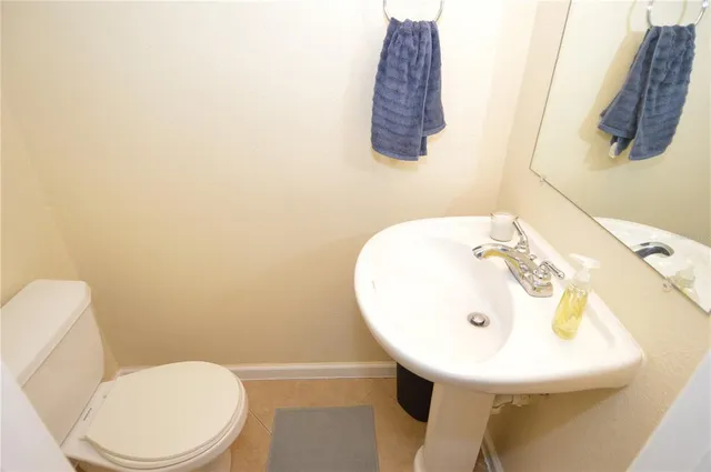 a view of a backyard with a patio and outdoor seating