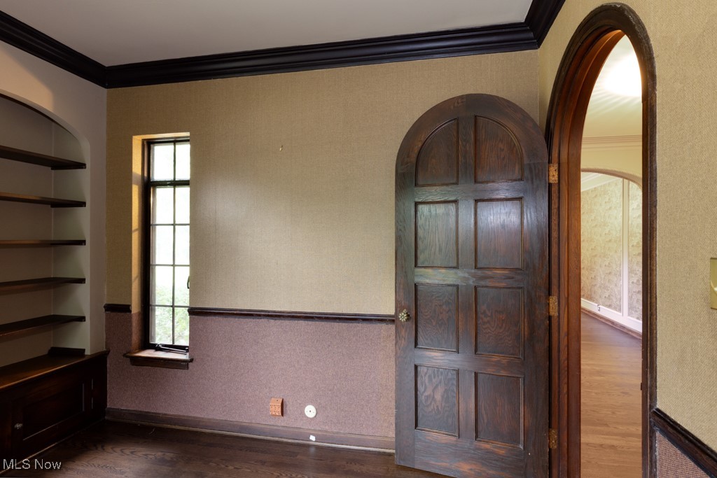 569 Merriman Road Akron, OH 44303 - Photo 12 of 43 Foyer with crown molding and dark hardwood / wood-style flooring