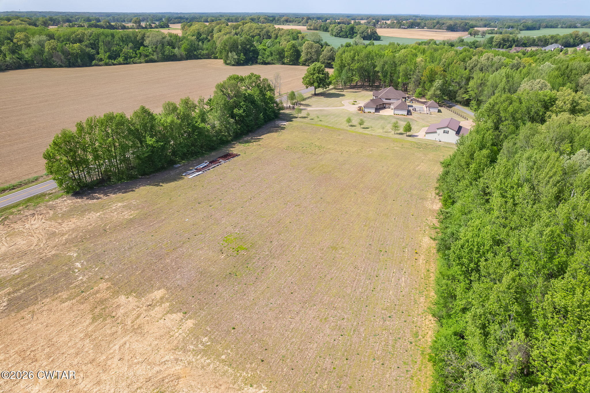 0 Windy City Road Jackson, TN 38305 - Photo 18 of 24 a view of a swimming pool with a yard