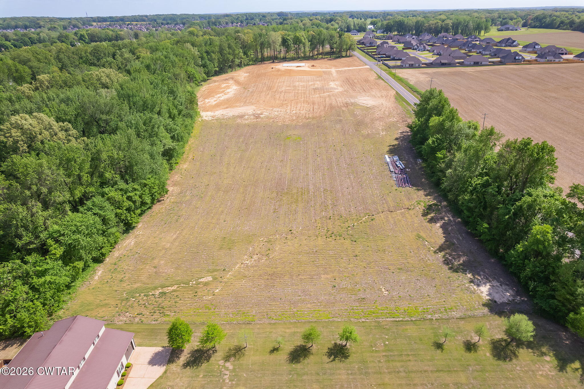 0 Windy City Road Jackson, TN 38305 - Photo 22 of 24 a view of a swimming pool with a yard