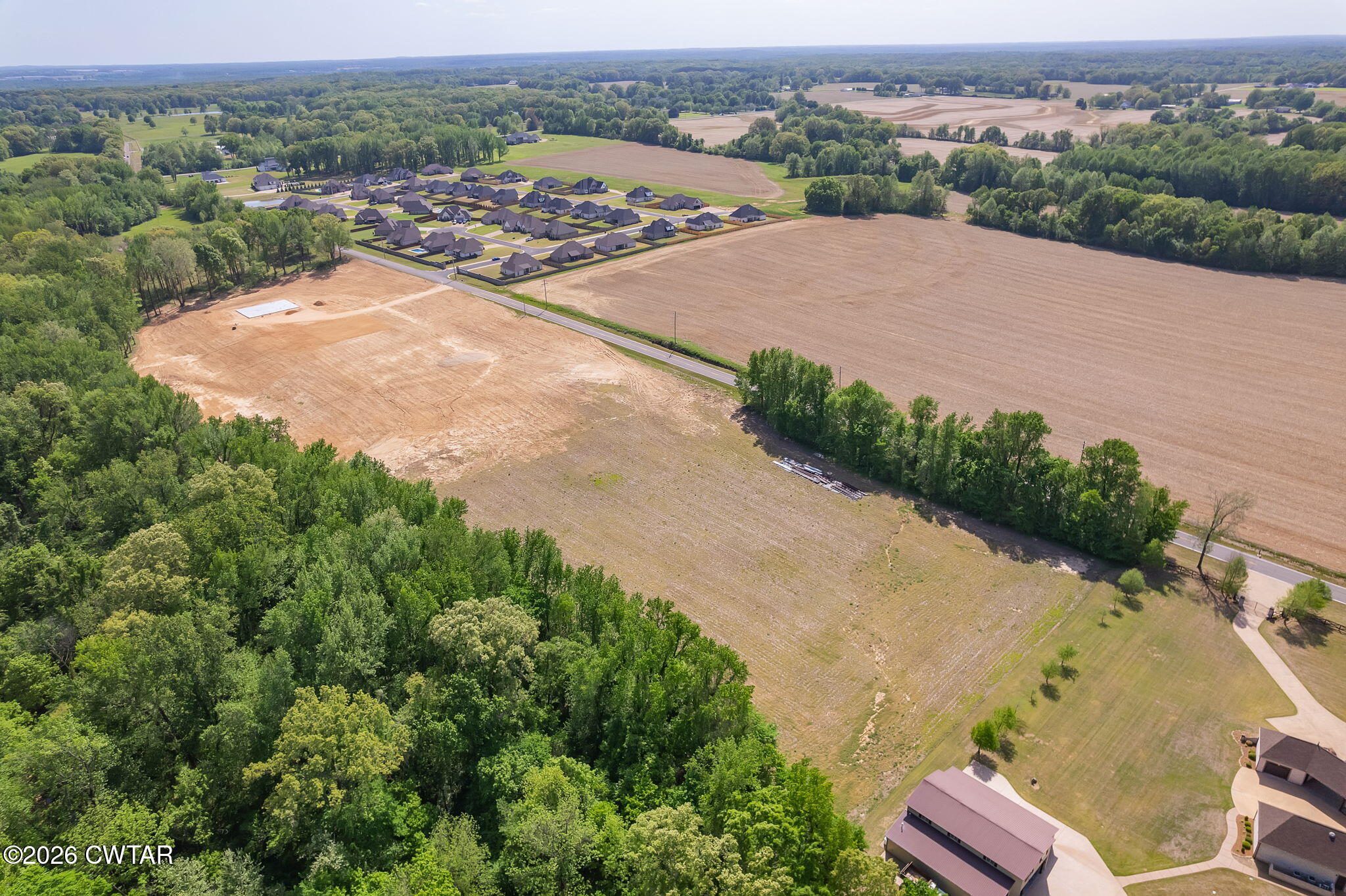 0 Windy City Road Jackson, TN 38305 - Photo 7 of 24 an aerial view of a house with a yard