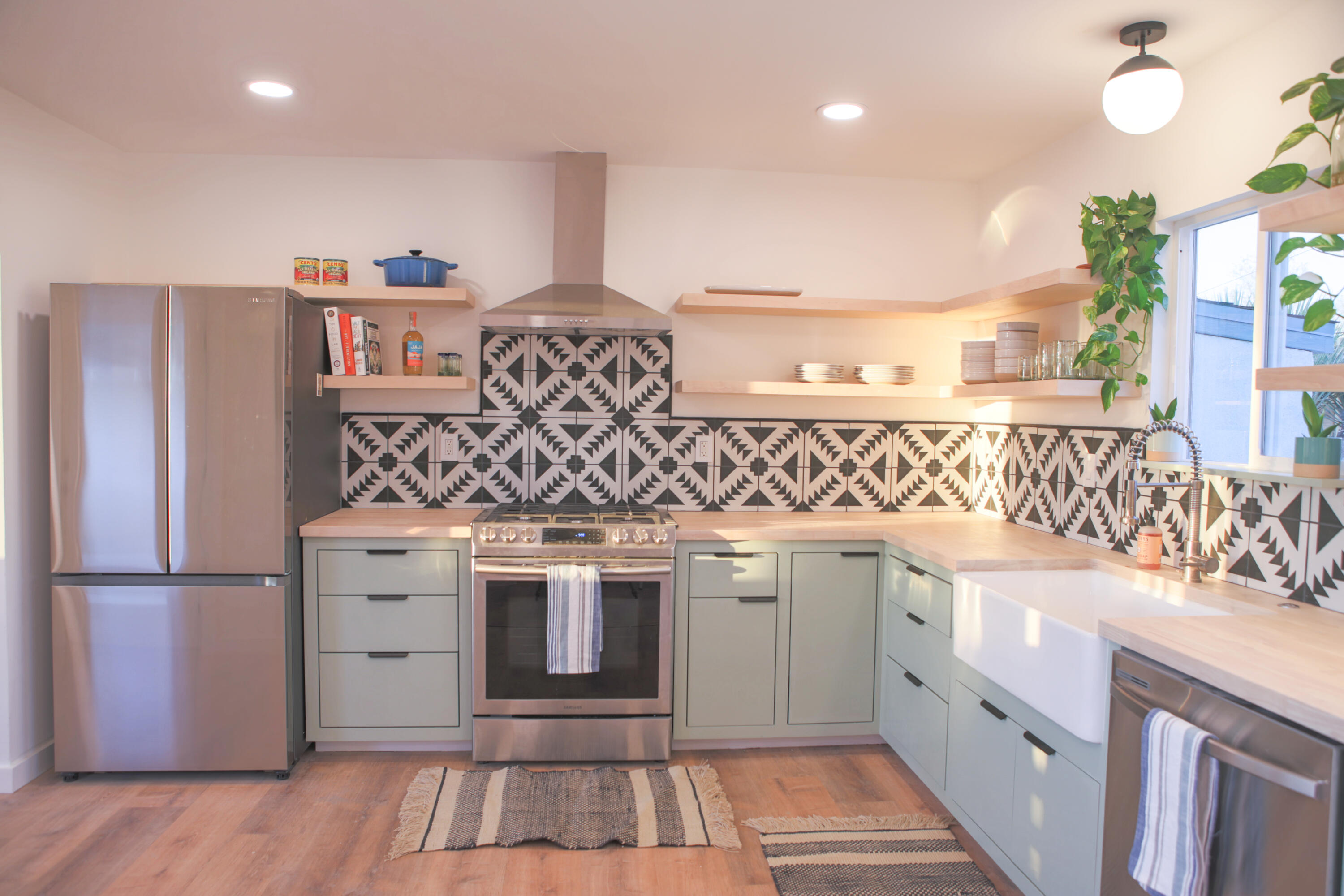 6126 Panorama Road Joshua Tree, CA 92252 - Photo 11 of 31 a kitchen with a sink stove and cabinets