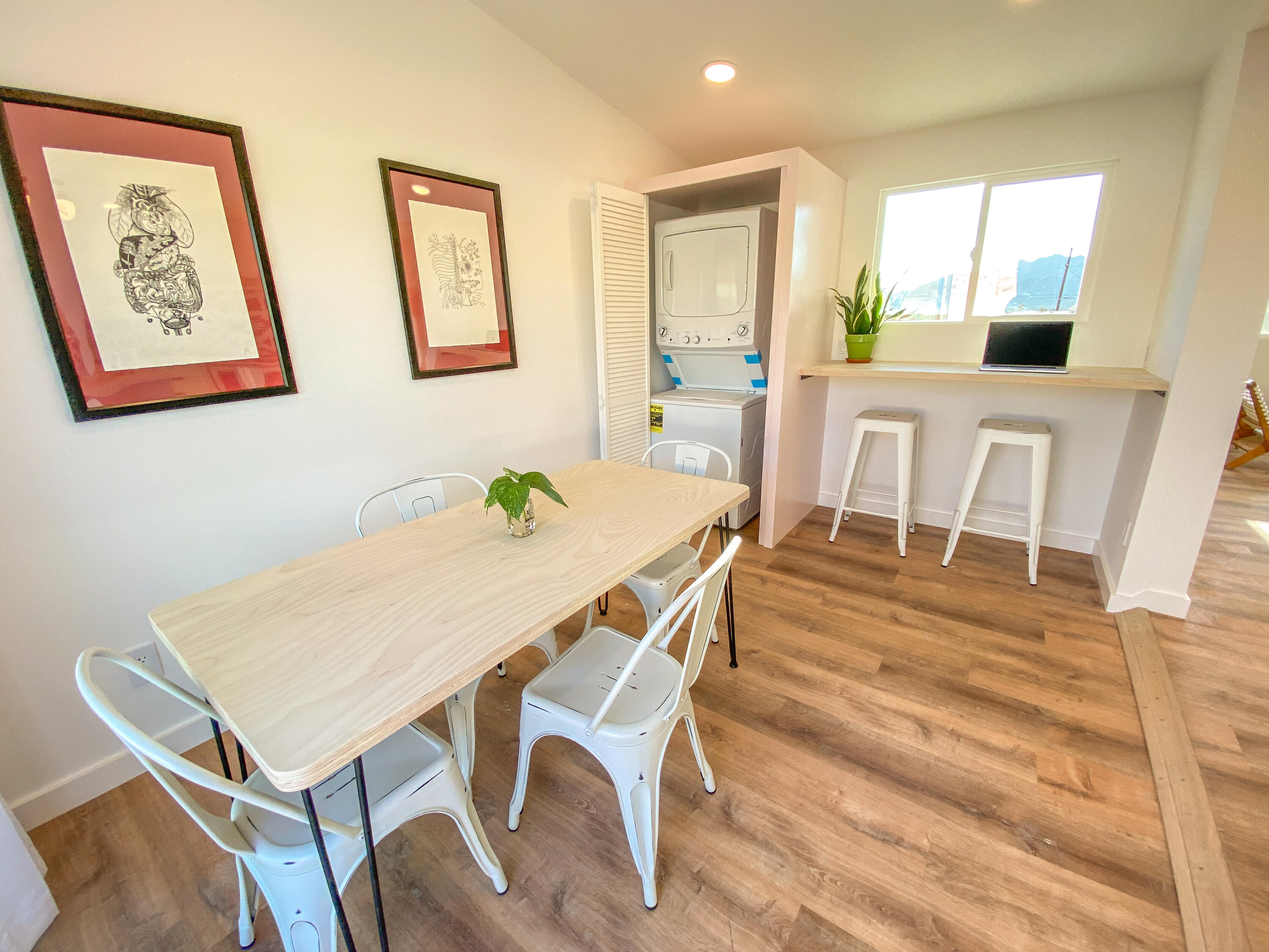 6126 Panorama Road Joshua Tree, CA 92252 - Photo 13 of 31 a view of a dining room with furniture window and wooden floor