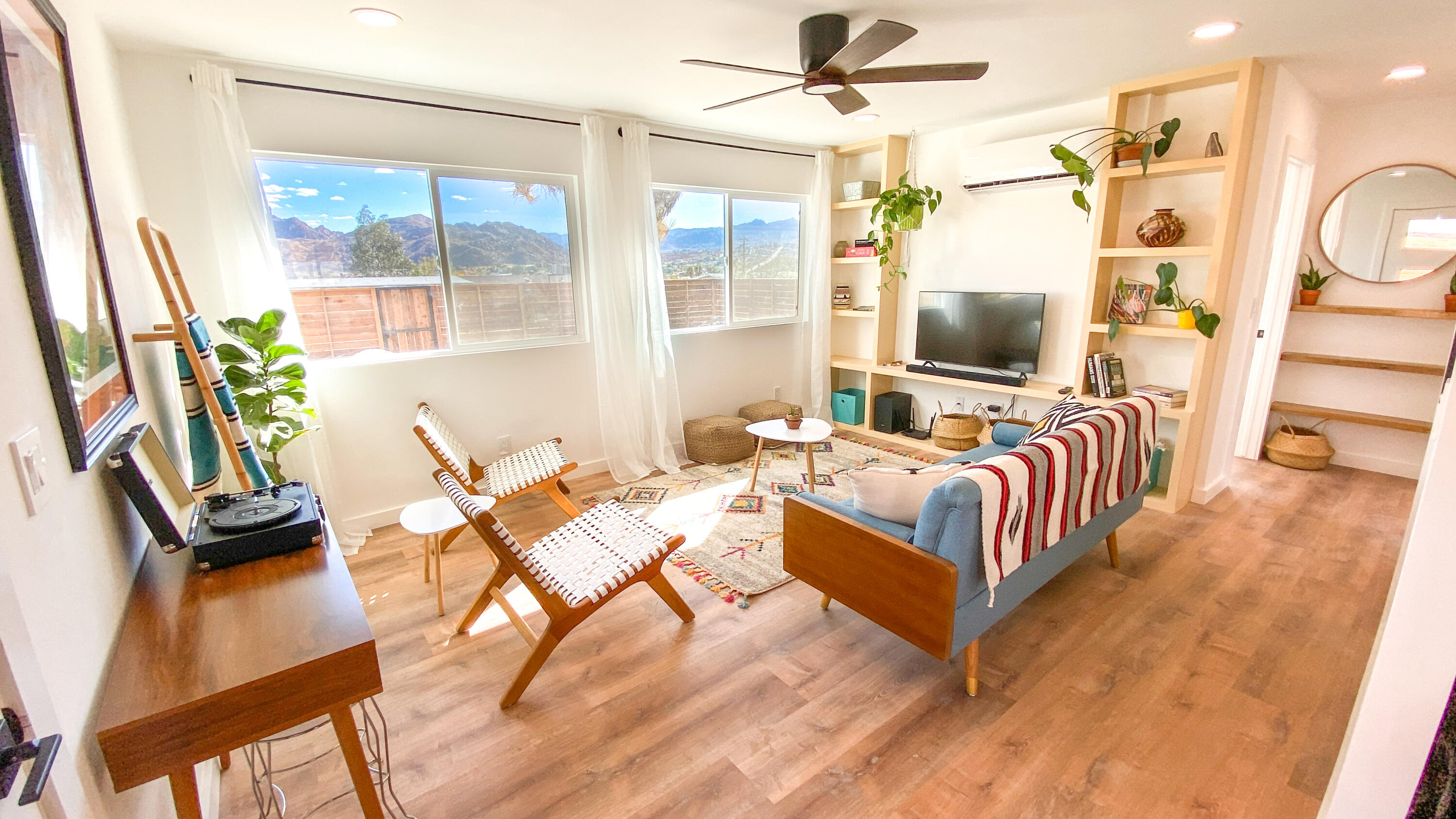 6126 Panorama Road Joshua Tree, CA 92252 - Photo 16 of 31 a living room with furniture and a flat screen tv