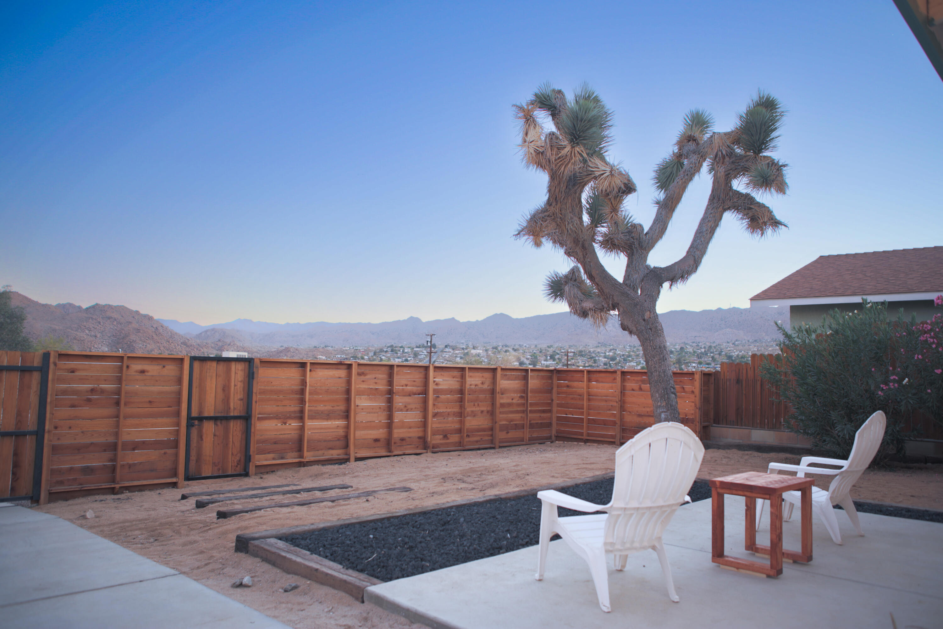 6126 Panorama Road Joshua Tree, CA 92252 - Photo 31 of 31 a view of a chairs and table in the terrace