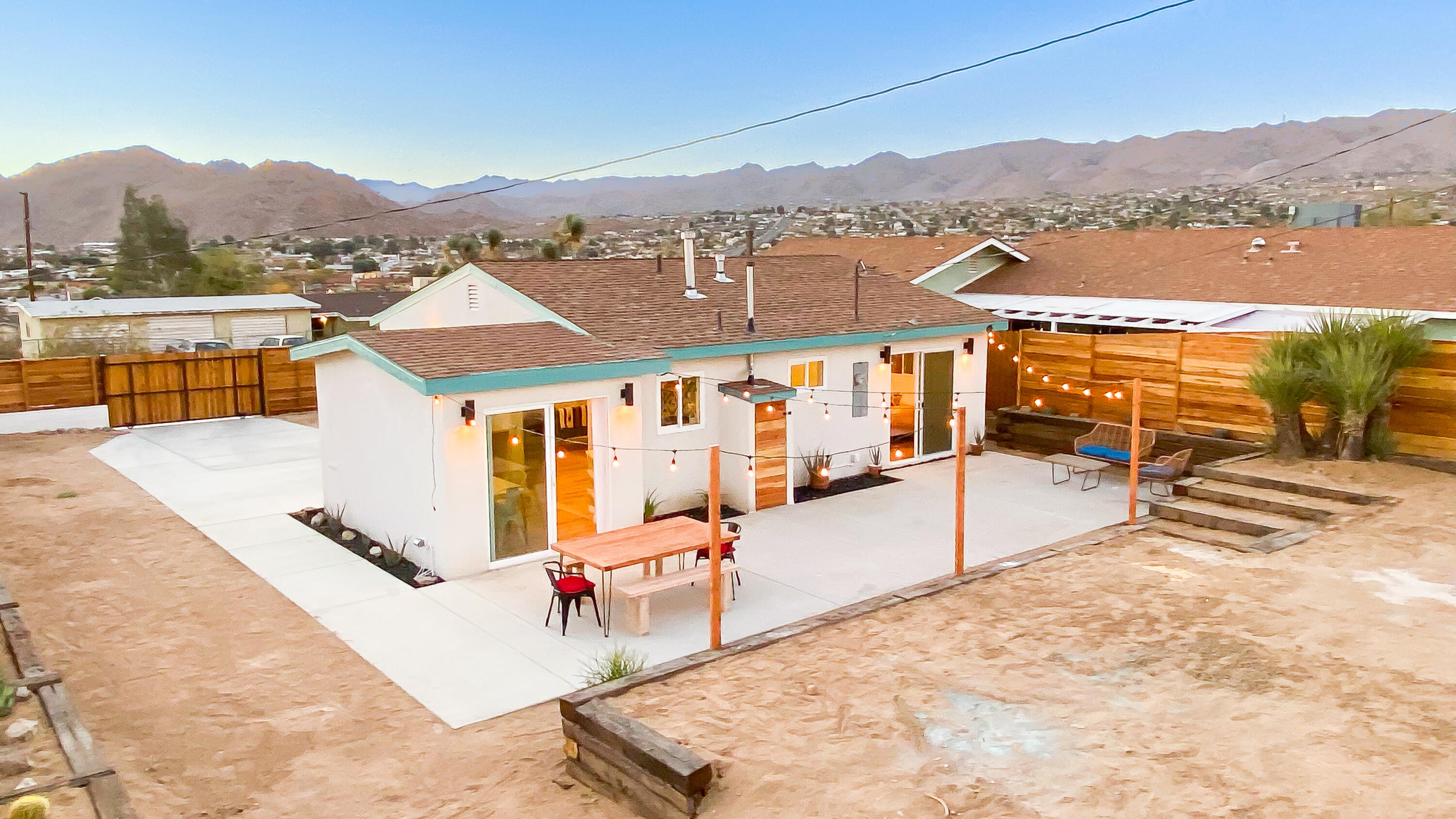 6126 Panorama Road Joshua Tree, CA 92252 - Photo 6 of 31 a view of a terrace with couches and wooden floor