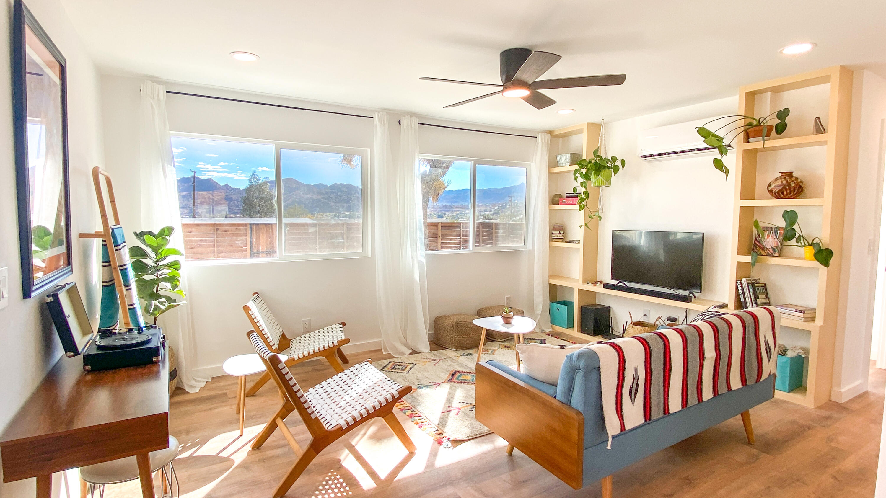 6126 Panorama Road Joshua Tree, CA 92252 - Photo 9 of 31 a living room with a couch and a flat screen tv