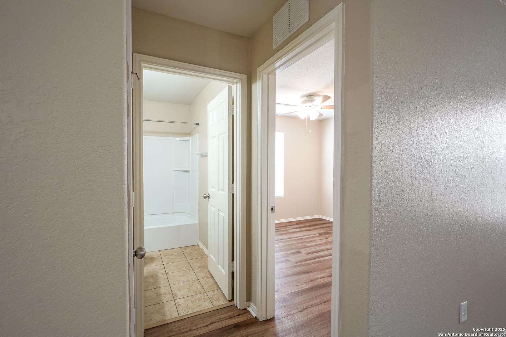 438 Walnut Crest Selma, TX 78154 - Photo 15 of 33 a view of a bathroom from a hallway