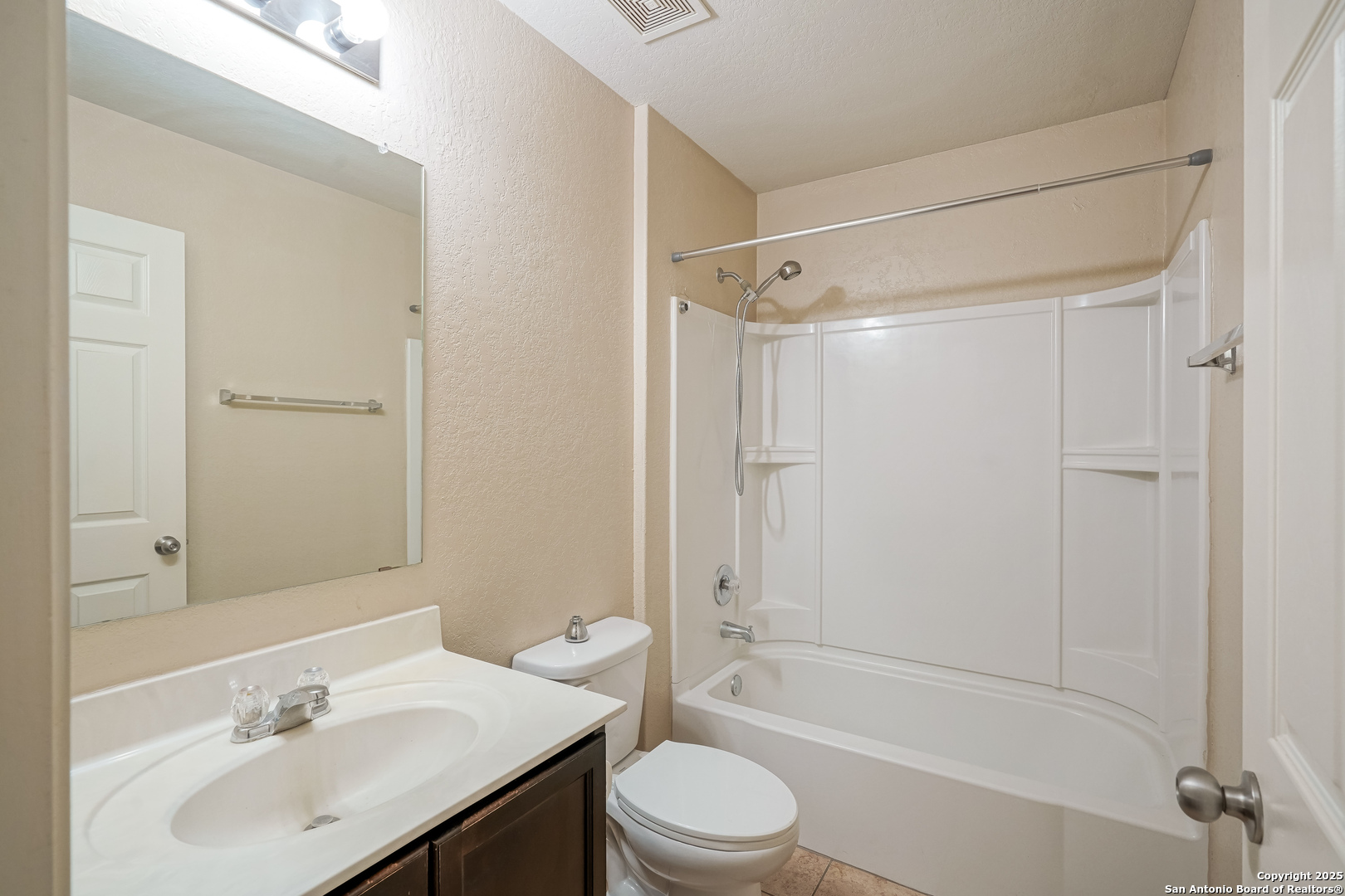 438 Walnut Crest Selma, TX 78154 - Photo 16 of 33 a bathroom with a sink a toilet and shower