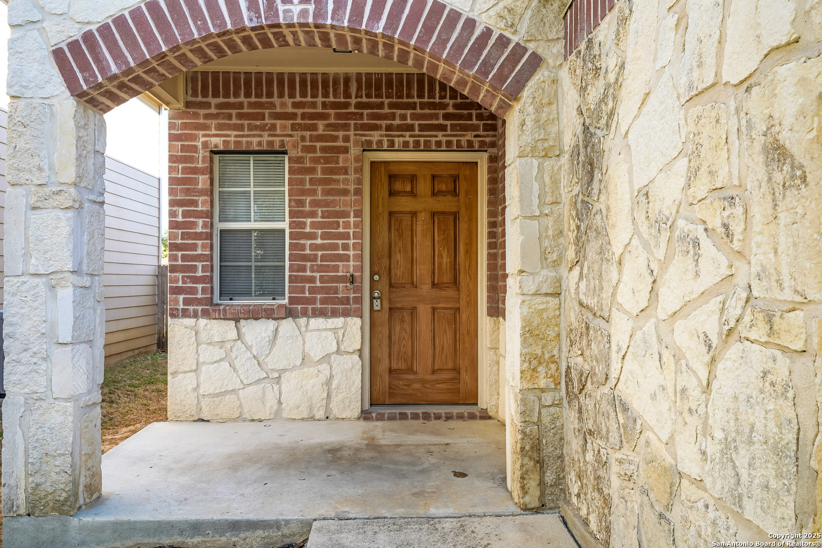 438 Walnut Crest Selma, TX 78154 - Photo 3 of 33 a front view of a house with a door