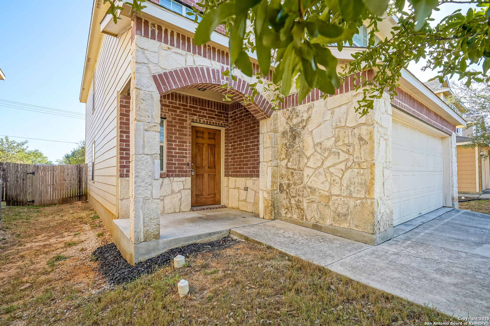 438 Walnut Crest Selma, TX 78154 - Photo 4 of 33 a entrance to house with yard