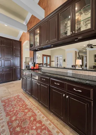 a view of a livingroom with furniture and a flat screen tv