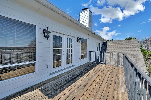 a view of a house with a yard and garage