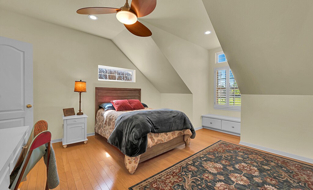 675 Cedar Canyon Road Crawford, TX 76638 - Photo 45 of 95 a bedroom with a bed and a chandelier