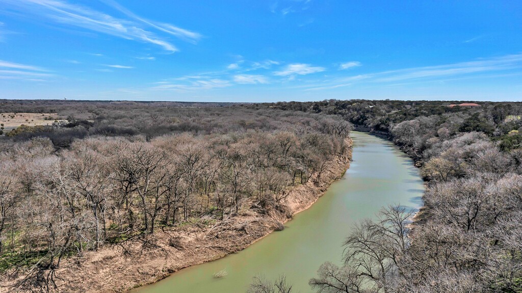 675 Cedar Canyon Road Crawford, TX 76638 - Photo 91 of 95 a view of a lake in middle of forest