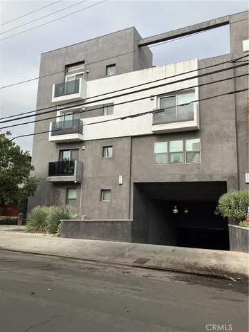 a front view of a house with a garage