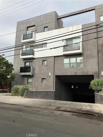 a front view of a house with a garage