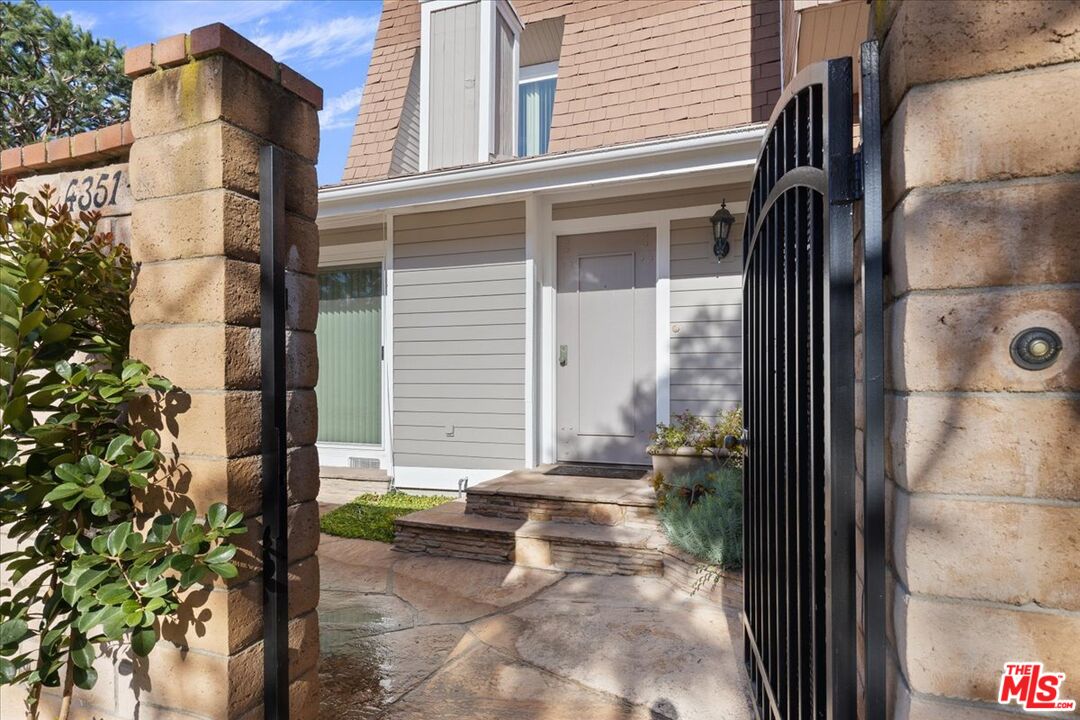 4351 Alla Road, Unit 8 Marina del Rey, CA 90292 - Photo 2 of 31 a view of a door with a door and a chair